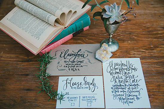 Wedding invitation suite with books and succulent detail