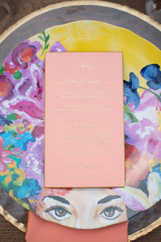 funky patterned plates with peach and gold menu