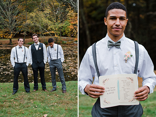 Groomsmen smiling at an outdoor wedding, one holding a wedding program