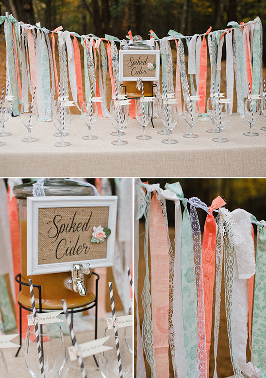 Rustic wedding cider station with ribbons and vintage details