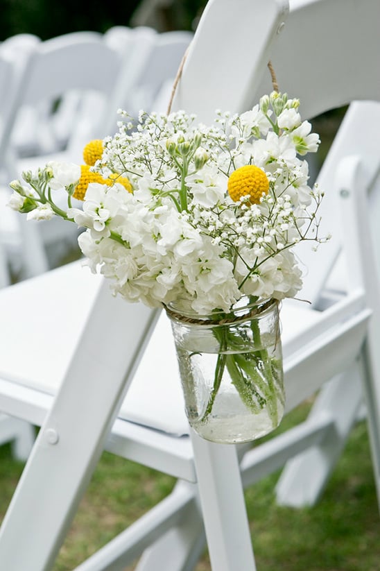 white florals with yellow billy buttons