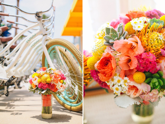 **Vibrant floral bouquet next to white beach cruiser bikes **