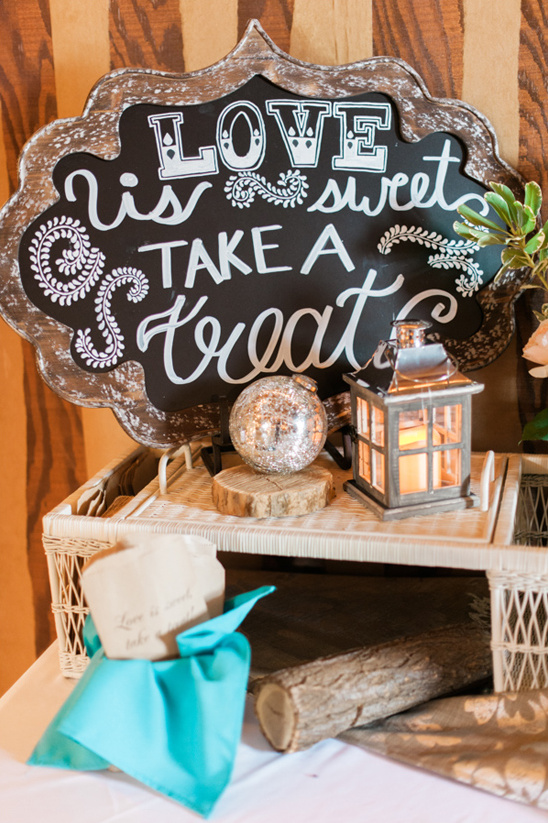 Love is sweet take a treat wedding sign with lantern