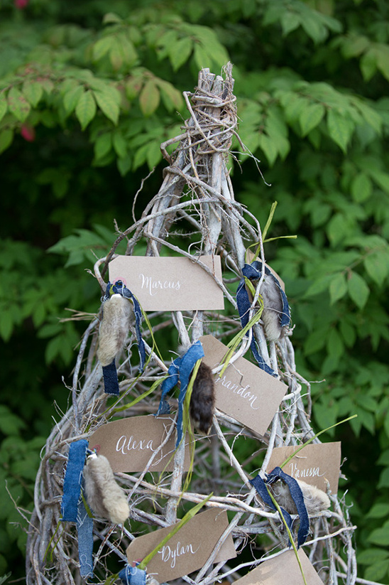 Rustic branch cone wedding place cards with fur tails