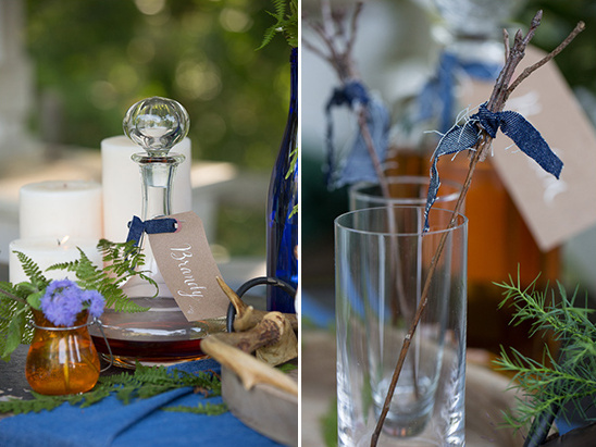 Rustic table decor with brandy candles and blue accents
