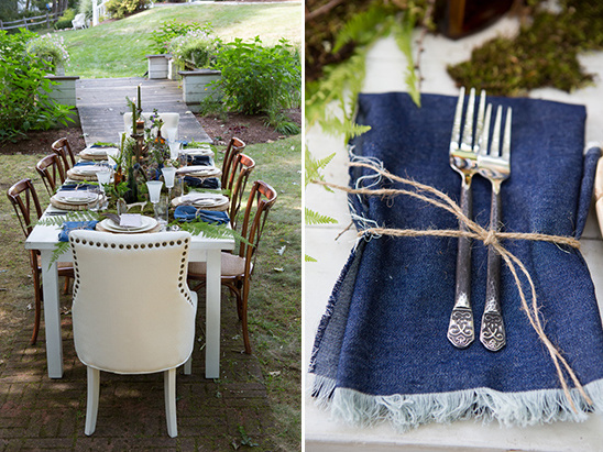 Outdoor dining table with blue napkins and rustic decor