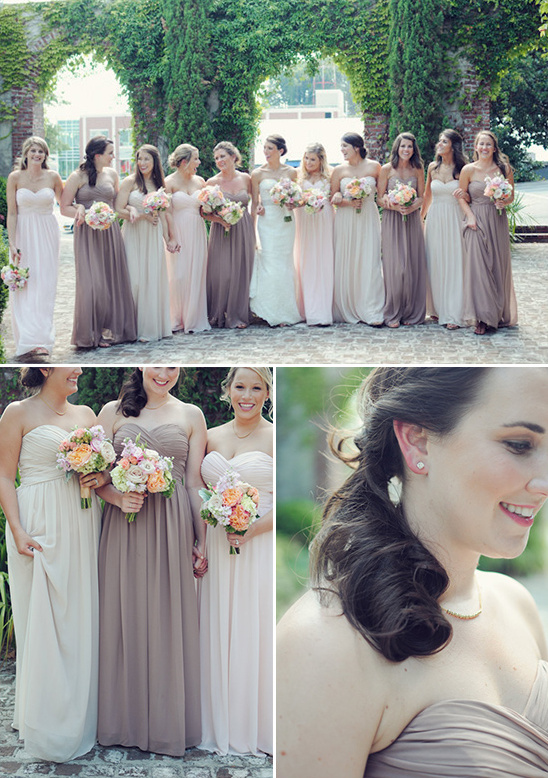 Outdoor wedding bride and bridesmaids in long dresses