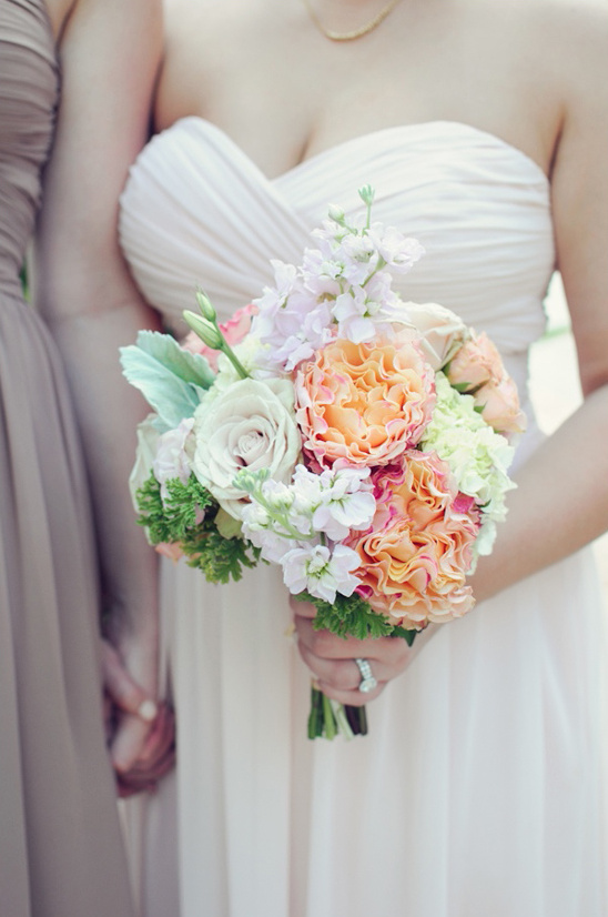 Elegant wedding bouquet peach roses and white flowers