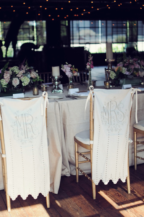 Elegant wedding chairs for Mr and Mrs at reception