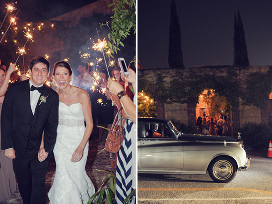Sparkler sendoff for newlyweds with vintage car at night