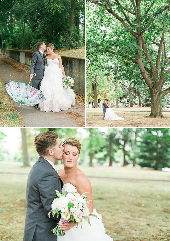 Groom lovingly kisses bride on wedding day in park