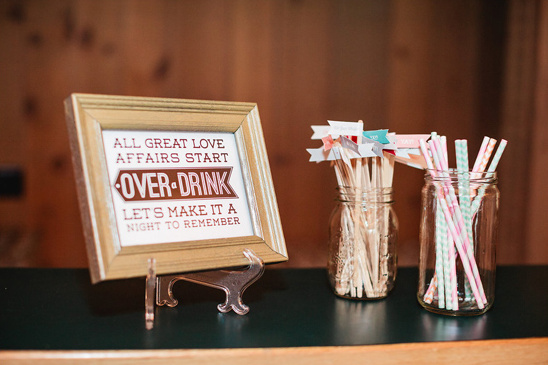 Wedding bar decor with a sign and drinks accessories, cozy ambiance
