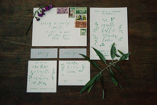 Elegant wedding invitations with green calligraphy