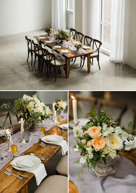 Rustic wooden table setting with flowers and candles