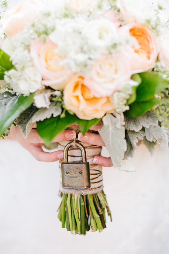 vintage lock on wedding bouquet