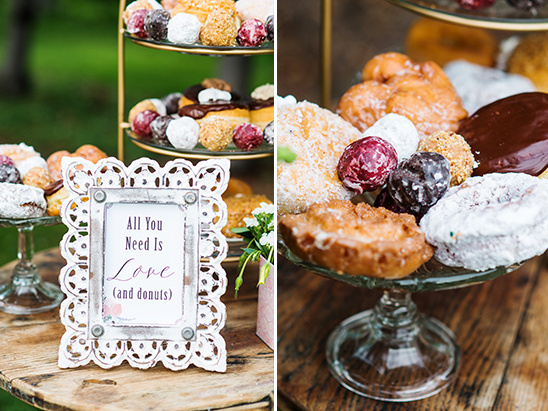 Delicious donuts and a sign saying All You Need Is Love for a wedding