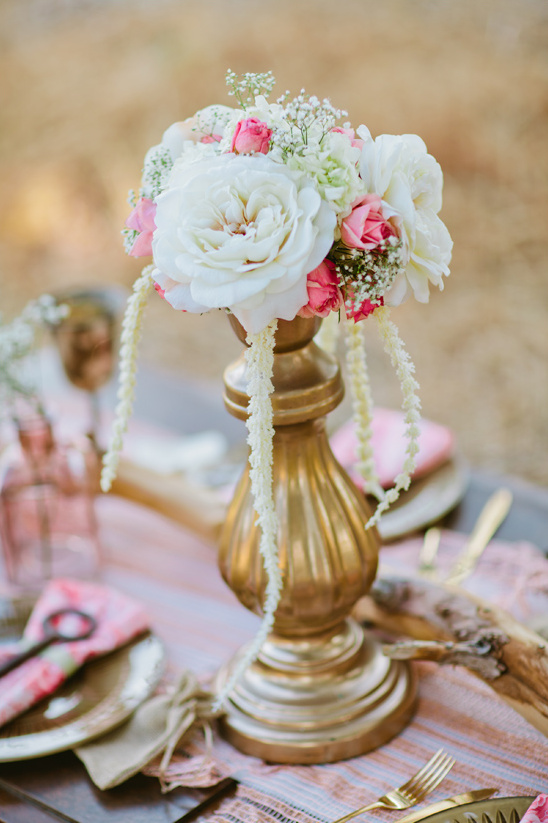 gold candle stick floral centerpieces