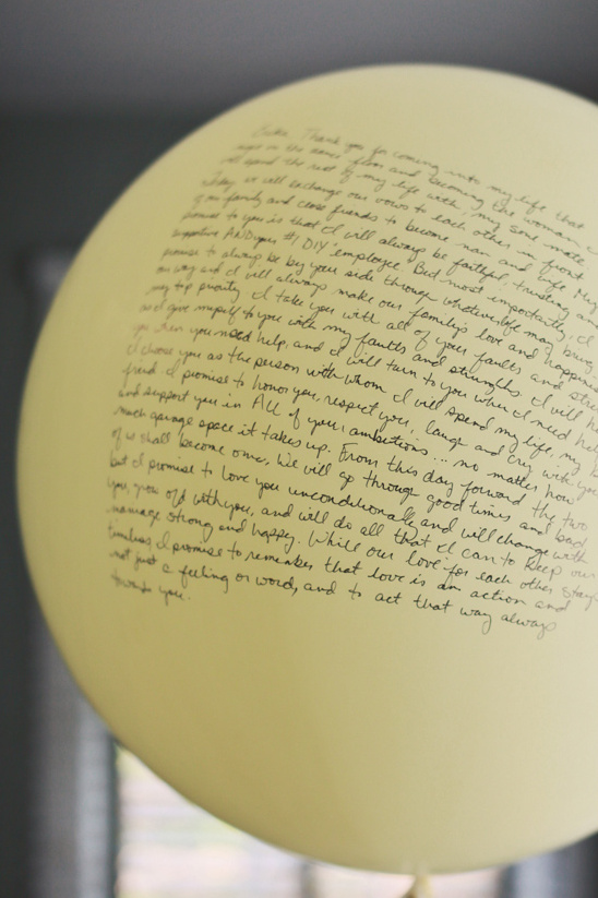 Pastel yellow balloon with handwritten wedding vows