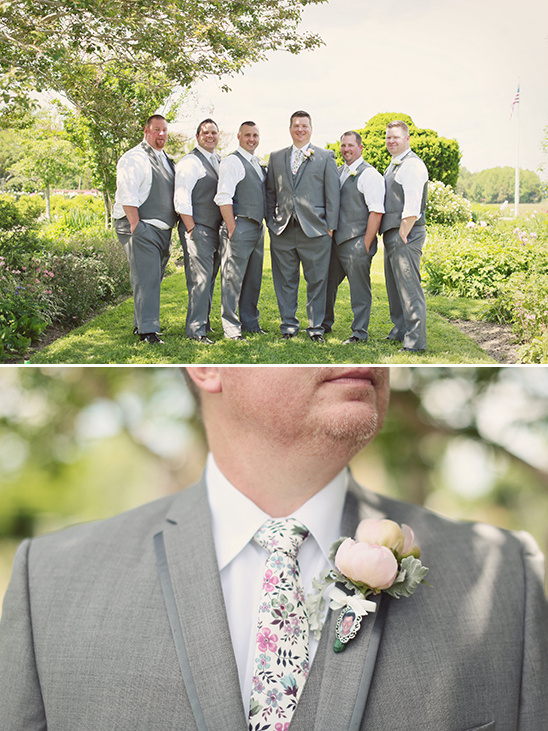 gray suit with floral tie
