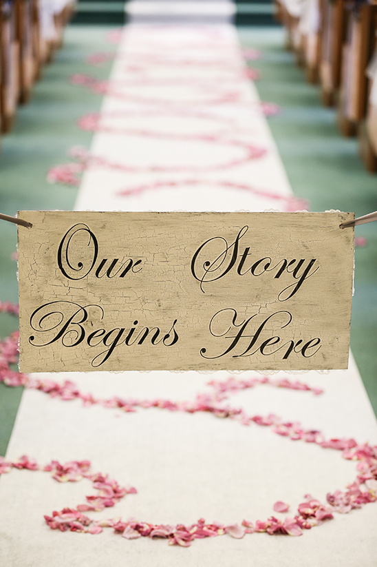 our story begins here aisle sign