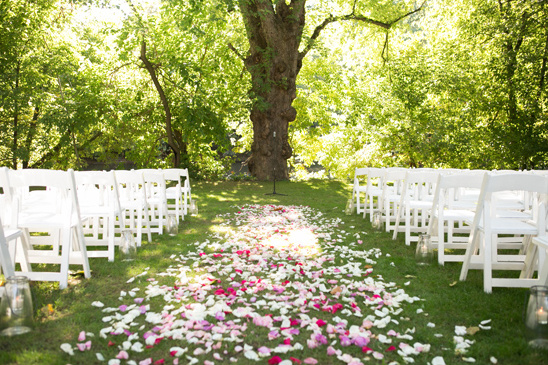 rose petal carpeted wedding aisle