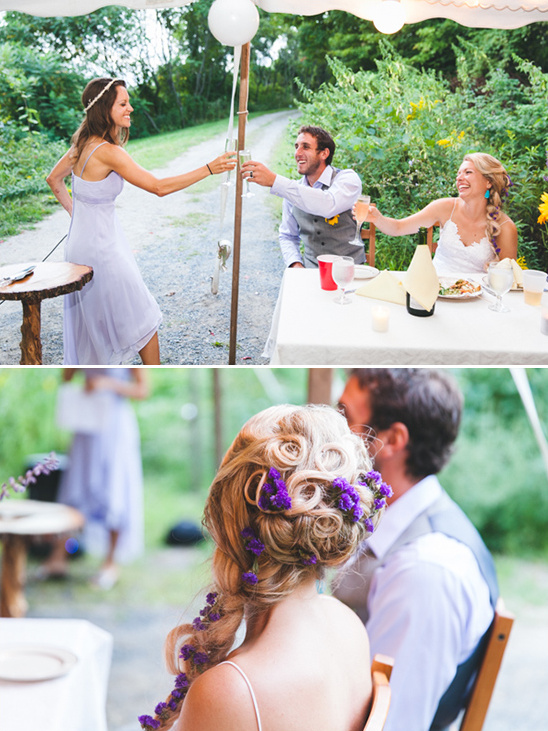 Outdoor wedding reception with bride and purple floral hair