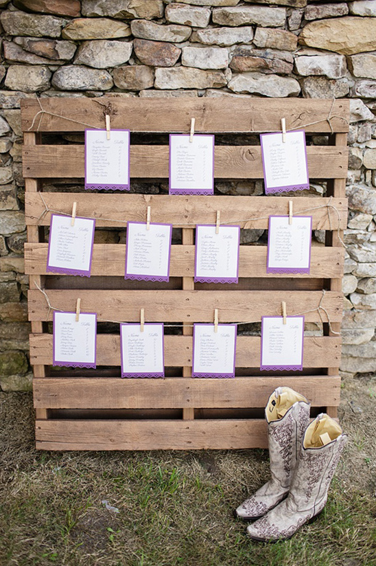 Rustic pallet wedding seating chart with cowboy boots