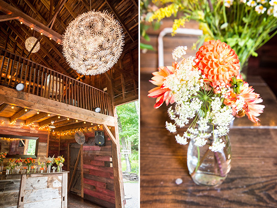 barn reception with daisy chandeliers