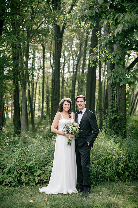 Bride and groom wedding photo in forest setting