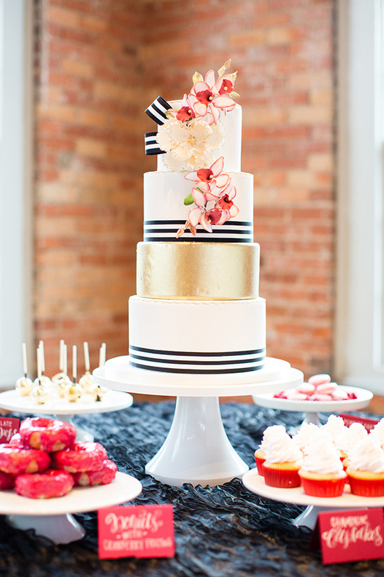 gold and white black striped cake