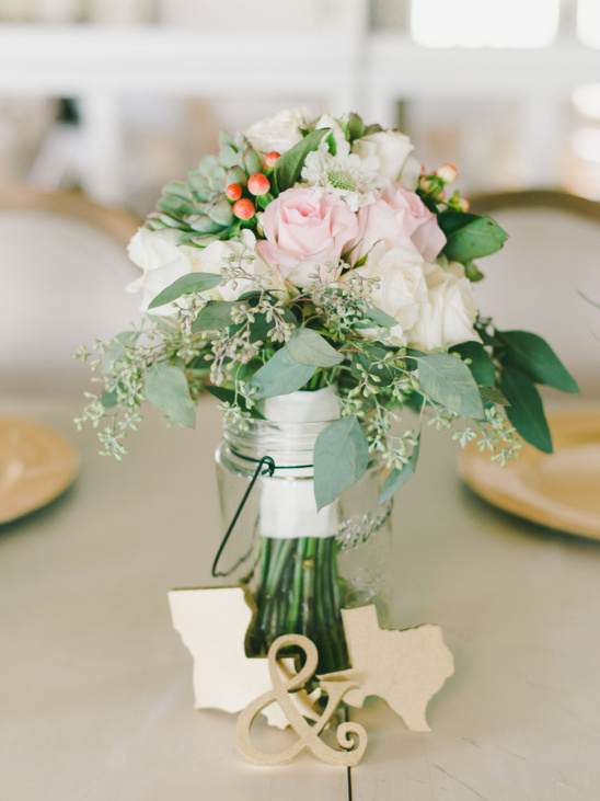 Rose bouquet in mason jar with Texas and Louisiana decor