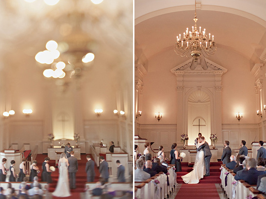 Bride and groom kissing at church altar during wedding