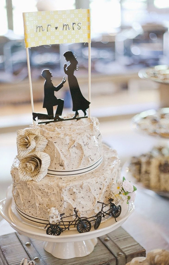 rustic wedding cake with silhouette cake topper