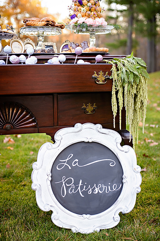 Pastry table with La Patisserie sign for outdoor event
