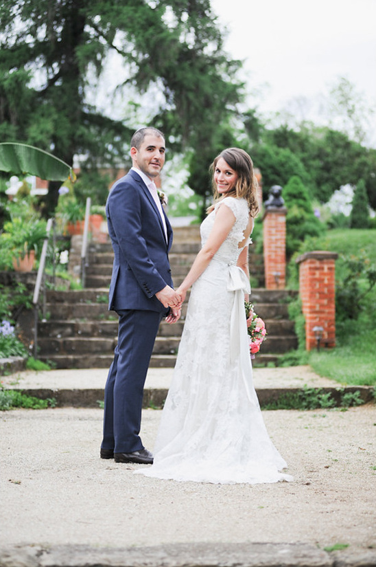 Bride and groom holding hands on their wedding day