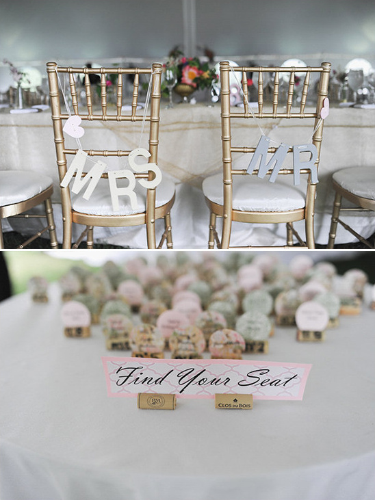 Wedding decor featuring chairs, Mr Mrs signs, and seating cards