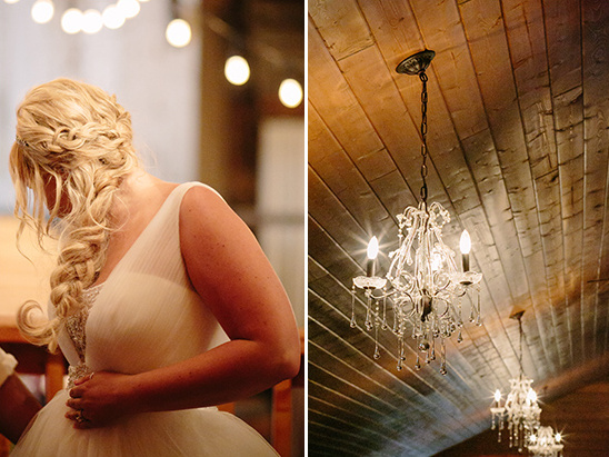 braided wedding hair and chandeliere lighting