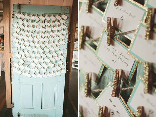 cute gold and teal escort card display