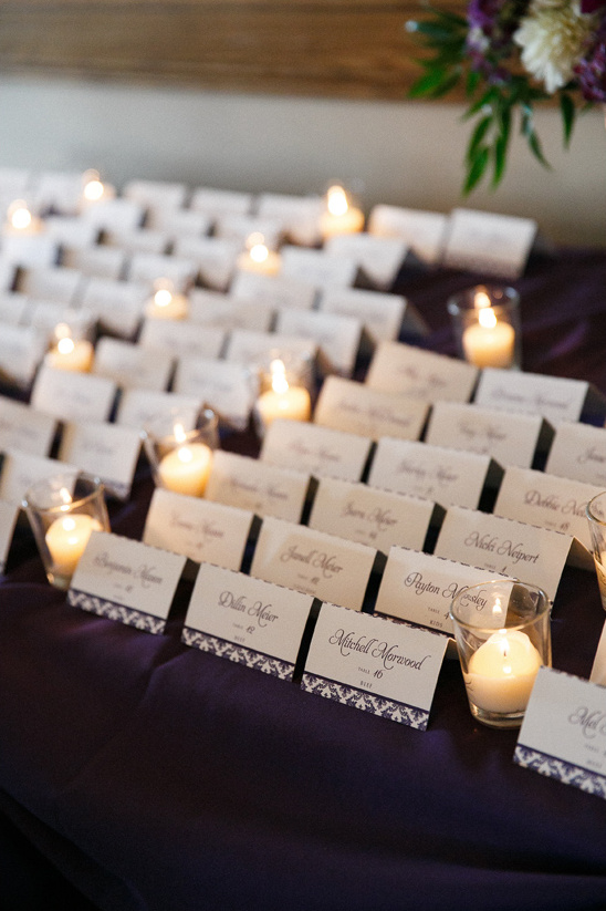Candlelight wedding place cards for guest seating arrangement