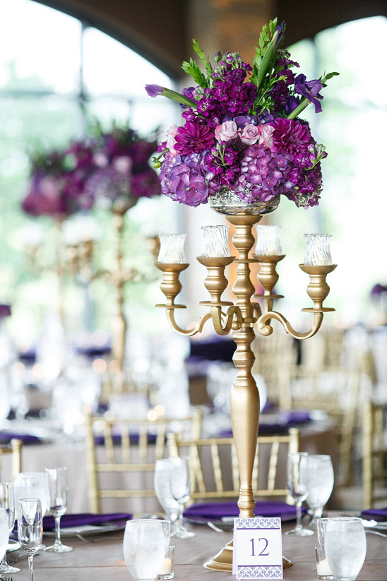 Elegant purple flower centerpiece on wedding table decor