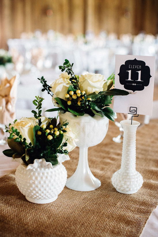 milk glass centerpieces and table number