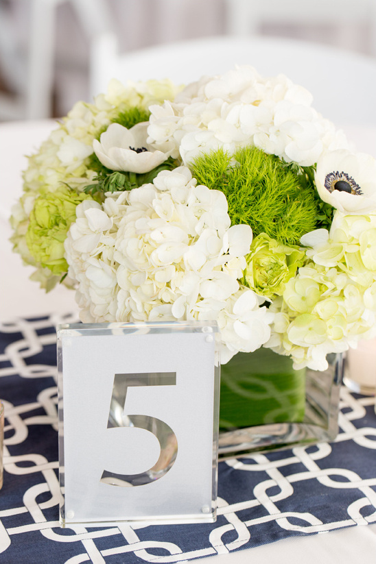 white and green centerpiece clear plexiglass table numbers