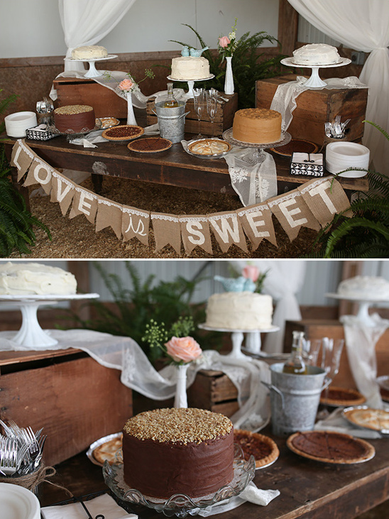 Wedding dessert table with cakes pies and a love is sweet banner