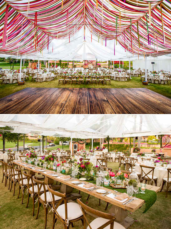 Stunning outdoor wedding tent decorated with ribbons