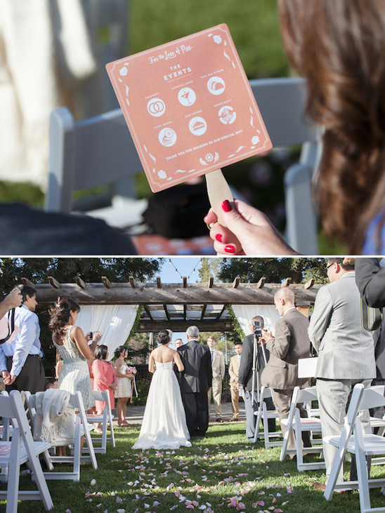 Outdoor wedding ceremony with fan programs and flower petals