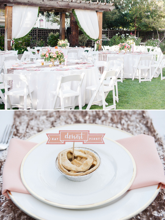 Outdoor wedding reception with dessert place setting