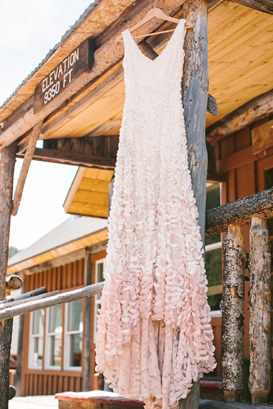 High elevation rustic wedding dress with petal details