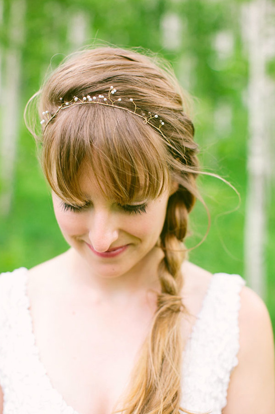 Woman with braid and pearl headband for rustic wedding