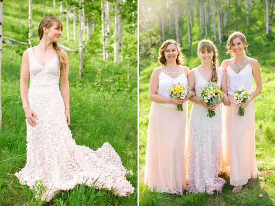 Bride and bridesmaids in beautiful outdoor wedding party