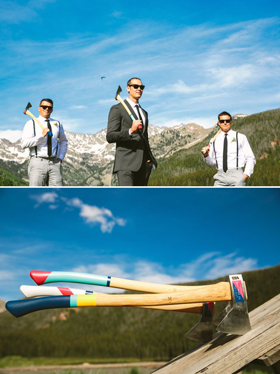 Groomsmen with axes at a lumberjack themed wedding